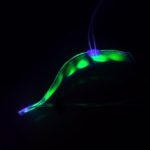 Translucent Robotic Eel Dips Underwater Silently Observing Marine Life