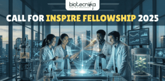 Call for INSPIRE Fellowship 2025 Fully Funded Research Opportunity by DST. A vibrant featured image banner for a life science freshers job posting. At the top, on a deep teal semi-transparent banner, is the white Biotecnika logo. Below it, in white text, is the headline "MSc LIFE SCIENCE FRESHERS JOB" followed by "at Thermo Fisher Scientific". The scene below shows five smiling young scientists in clean lab coats collaborating dynamically around a large, transparent holographic display of a complex molecular structure in a state-of-the-art, sunlit life science laboratory. Centered at the bottom, there is a green-blue button with wave patterns that says "Apply now".
