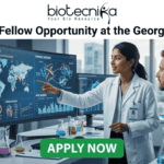 Research Fellow at George Institute | Fresher's Job India. A professional featured job image with the Biotecnika logo at the top and a bold headline reading "Research Fellow Opportunity at the George Institute." The central scene features a female scientist in a white lab coat pointing to a large digital monitor displaying global health maps, data analytics, and chronic disease trends, while a male colleague looks on. The setting is a modern, high-tech laboratory equipped with a microscope and glassware. At the bottom center, there is a prominent green "APPLY NOW" button.