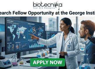 Don’t Miss This Research Fellow Opportunity at George Institute – Perfect Fresher’s Job in Life Sciences! Research Fellow at George Institute | Fresher's Job India. A professional featured job image with the Biotecnika logo at the top and a bold headline reading "Research Fellow Opportunity at the George Institute." The central scene features a female scientist in a white lab coat pointing to a large digital monitor displaying global health maps, data analytics, and chronic disease trends, while a male colleague looks on. The setting is a modern, high-tech laboratory equipped with a microscope and glassware. At the bottom center, there is a prominent green "APPLY NOW" button.