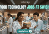 Exciting Food Technology Jobs Alert at Swish | Don't Miss This Opporunity. A unique and futuristic featured image for "Food Technology Jobs at Swish." Two scientists in a high-tech food lab are examining a glowing, layered "tech-food" sample. The lab is equipped with 3D food printers and robotic arms. The Biotecnika logo is at the top, and a clean "Apply Now" button with an arrow is at the bottom center.