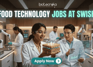Exciting Food Technology Jobs Alert at Swish | Don’t Miss This Opportunity Exciting Food Technology Jobs Alert at Swish | Don't Miss This Opporunity. A unique and futuristic featured image for "Food Technology Jobs at Swish." Two scientists in a high-tech food lab are examining a glowing, layered "tech-food" sample. The lab is equipped with 3D food printers and robotic arms. The Biotecnika logo is at the top, and a clean "Apply Now" button with an arrow is at the bottom center.
