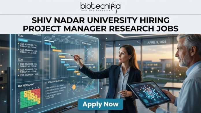 Research Jobs at Shiv Nadar University | Apply Now Research Jobs at Shiv Nadar University | Apply Now. A high-quality, realistic featured image for a "Project Manager Research Jobs" opening at Shiv Nadar University. The scene features a professional woman in business attire interacting with a large, glowing transparent digital dashboard that displays research project timelines (Gantt charts), risk assessment matrices, and milestones for "Advanced Cell Therapy." A senior male colleague stands nearby holding a tablet with a 3D molecular visualization. The setting is a sleek, modern office with large windows overlooking a university campus at sunset. The Biotecnika logo is at the top, the main job title is in bold black text, and a prominent blue "Apply Now" button is at the bottom.