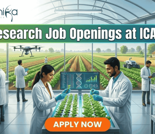 25+ Research Job Openings at ICAR-IARI – Online Interview . A featured image for a job advertisement titled "25+ Research Job Openings at ICAR-IARI." The image depicts a futuristic, high-tech agricultural laboratory set within a large glass greenhouse. In the foreground, a female and a male scientist in white lab coats are working at a digital station, examining young green plants. Digital screens display DNA sequences and plant growth data. In the background, a drone flies over rows of crops, and through the glass walls, traditional farmers are seen working in lush green fields. The Biotecnika logo is at the top left, and a prominent orange "APPLY NOW" button is centered at the bottom.