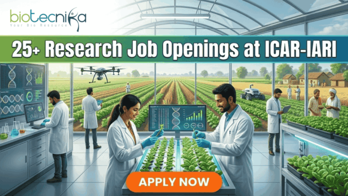 25+ Research Job Openings at ICAR-IARI – Online Interview 25+ Research Job Openings at ICAR-IARI – Online Interview . A featured image for a job advertisement titled "25+ Research Job Openings at ICAR-IARI." The image depicts a futuristic, high-tech agricultural laboratory set within a large glass greenhouse. In the foreground, a female and a male scientist in white lab coats are working at a digital station, examining young green plants. Digital screens display DNA sequences and plant growth data. In the background, a drone flies over rows of crops, and through the glass walls, traditional farmers are seen working in lush green fields. The Biotecnika logo is at the top left, and a prominent orange "APPLY NOW" button is centered at the bottom.