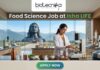 Food Science Job at Isha LIFE R&D Specialist Role. A featured image for a job posting titled "Food Science Job at Isha LIFE." The image displays a professional female scientist in a white lab coat working in a modern, high-tech food laboratory. On the lab counter, there are various bowls of natural grains, herbs, and scientific testing equipment. Through the large glass windows in the background, the iconic Adi Yogi statue is visible against a scenic mountain landscape, reflecting the Isha Foundation theme. The Biotecnika logo is positioned at the top center, and a prominent green "APPLY NOW" button is located at the bottom.