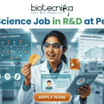 Food Science Job in R&D at PepsiCo – Freshers Can Apply Now! Food Science Job in R&D at PepsiCo – Freshers Can Apply Now! A promotional image featuring the 'biotecnika Your Bio Resource' logo at the top and the large headline 'Computational Biology Job at Springer Nature'. The central figure is a professional woman of South Asian descent, in a white shirt and dark trousers, pointing enthusiastically at a large, glowing interactive wall display. The display presents various complex scientific visualizations, including colorful gene interaction networks, detailed protein structures, a large and beautiful stylized phylogenetic tree, and key research insights with a donut chart. In the blurred background, other professionals work in a high-tech, futuristic office with glowing screens. A prominent, multi-colored button at the bottom center reads 'APPLY NOW'. The overall scene is high-tech, scientific, and inviting.