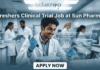 Clinical Trial Job Alert: Freshers Wanted at Sun Pharma – Start Your Clinical Research Career Today! Freshers Clinical Trial Job at Sun Pharma | Don't Miss It. A featured image for a job posting titled "Freshers Clinical Trial Job at Sun Pharma" in a $1280 \times 720$ format.The image depicts a modern, high-tech laboratory setting where a young, smiling male scientist in a white lab coat is working with a pipette and a multi-well plate. A transparent digital holographic display in front of him shows "Clinical Trial Data" with various charts and graphs. In the background, other researchers are visible in a clean, professional clinical environment.The Biotecnika logo is positioned clearly at the top center, and a prominent, rounded "APPLY NOW" button is located at the bottom center. The overall aesthetic is professional, bright, and engaging.