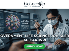 Government Life Science Job Alert 2026 – Earn Upto ₹56,000 + HRA as Research Scientist at ICAR-IVRI!. Professional featured image for a "Government Life Science Job Alert at ICAR-IVRI" advertisement. The image depicts a female scientist in a white lab coat and protective gear using a pipette in a high-tech laboratory setting. A large computer monitor in the background displays detailed 3D pathogen genomics and vaccine development data. The layout features the Biotecnika logo at the top and a prominent green "APPLY NOW" button at the bottom center.