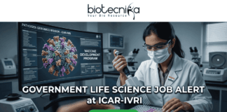 Government Life Science Job Alert 2026 – Earn Upto ₹56,000 + HRA as Research Scientist at ICAR-IVRI! Government Life Science Job Alert 2026 – Earn Upto ₹56,000 + HRA as Research Scientist at ICAR-IVRI!. Professional featured image for a "Government Life Science Job Alert at ICAR-IVRI" advertisement. The image depicts a female scientist in a white lab coat and protective gear using a pipette in a high-tech laboratory setting. A large computer monitor in the background displays detailed 3D pathogen genomics and vaccine development data. The layout features the Biotecnika logo at the top and a prominent green "APPLY NOW" button at the bottom center.