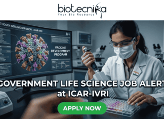 Government Life Science Job Alert 2026 – Earn Upto ₹56,000 + HRA as Research Scientist at ICAR-IVRI!. Professional featured image for a "Government Life Science Job Alert at ICAR-IVRI" advertisement. The image depicts a female scientist in a white lab coat and protective gear using a pipette in a high-tech laboratory setting. A large computer monitor in the background displays detailed 3D pathogen genomics and vaccine development data. The layout features the Biotecnika logo at the top and a prominent green "APPLY NOW" button at the bottom center.