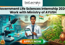 Government Life Sciences Internship 2026 at CCIH | Work with Ministry of AYUSH Government Life Sciences Internship 2026 Work with Ministry of AYUSH. A featured image for Biotecnika Global promoting a "Government Life Sciences Internship 2026: Work with Ministry of AYUSH." The graphic features a young male scientist in a white lab coat standing at the center, holding a digital tablet. The background is a vibrant blend of modern biotechnology—showing molecular models and lab equipment—and traditional Indian medicine, featuring medicinal herbs, a Tulsi plant, and a stone mortar and pestle. In the distance, a grand government building flies the Indian national flag. The top of the image displays the Biotecnika logo, and a prominent orange "APPLY NOW" button is centered at the bottom.