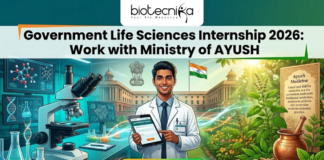 Government Life Sciences Internship 2026 Work with Ministry of AYUSH. A featured image for Biotecnika Global promoting a "Government Life Sciences Internship 2026: Work with Ministry of AYUSH." The graphic features a young male scientist in a white lab coat standing at the center, holding a digital tablet. The background is a vibrant blend of modern biotechnology—showing molecular models and lab equipment—and traditional Indian medicine, featuring medicinal herbs, a Tulsi plant, and a stone mortar and pestle. In the distance, a grand government building flies the Indian national flag. The top of the image displays the Biotecnika logo, and a prominent orange "APPLY NOW" button is centered at the bottom.