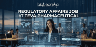 Regulatory Affairs Job at Teva Pharmaceutical | Life Science Careers. Featured image of a job advertisement, 1280x720 pixels, with a corporate yet futuristic aesthetic designed for high engagement. At the top center, the "biotecnika Your Bio Resource" logo and text from image_0.png is clearly displayed in white against a data-patterned background. Below the logo is the main headline in large, bold, clean white text: "REGULATORY AFFAIRS JOB AT TEVA PHARMACEUTICAL". The central figure is a female professional (woman of color) in a sleek business suit and a headset microphone, confidently presenting at a large, transparent interactive display table. The table and large wall-mounted transparent screens around her display glowing, complex data visualizations related to generic drug regulatory approval and pharma R&D processes, all with a clean, high-tech interface. Text on the screens is legible and includes elements like: a global map for "Generic drug regulatory approval" with dates; a "Moiety Analysis" bar chart; a "Bioequivalence study data" comparison chart; a "CMC Module Clinical Data Analysis" diagram; and a detailed "approval roadmap" flowchart. Text terms such as 'Label submission', 'Label Review', 'Moiety Analysis', and 'Bioequivalence study data' are clearly visible on the screens. The background is a modern, high-rise office at night, looking out over a city skyline, with blurred images of other diverse colleagues collaborating at desks, suggesting a busy and professional environment. At the bottom center of the image, there is a prominent, clean, orange "APPLY NOW" button with bold white text, serving as a clear call to action. The overall lighting is sophisticated, balancing the cool glow of the data interfaces with warm ambient office light. No actual Teva Pharmaceutical company logo is present, only the name in the main text headline and related generic data visualizations.