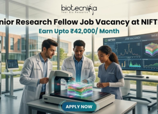 High Paying Senior Research Fellow Job Vacancy at NIFTEM | Earn Upto ₹42,000/ Month High Paying Senior Research Fellow Job Vacancy at NIFTEM Earn Upto ₹42,000 Month. A professional and vibrant featured image for a "Senior Research Fellow Job Vacancy at NIFTEM." The scene showcases three diverse researchers in white lab coats working in a sunlit, state-of-the-art food technology laboratory. They are gathered around an advanced imaging device analyzing a 3D-rendered food sample. A large digital monitor in the background displays complex data visualizations and structural models. The Biotecnika logo is positioned at the top center. The primary text reads "Senior Research Fellow Job Vacancy at NIFTEM" with a sub-headline "Earn Upto ₹42,000/ Month." A sleek, glowing "APPLY NOW" button is located at the bottom.