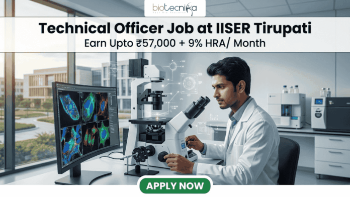 High-Paying Technical Officer Job at IISER Tirupati – Apply Before Deadline! High-Paying Technical Officer Job at IISER Tirupati – Apply Before Deadline!. A professional recruitment graphic for a Technical Officer job at IISER Tirupati. The image features a focused male scientist in a modern, brightly lit laboratory environment, working with high-tech equipment and dual monitors displaying colorful microscopic cell images. At the top, the Biotecnika logo is positioned above bold text that reads: "Technical Officer Job at IISER Tirupati" with a tagline "Earn Upto ₹57,000 + 9% HRA/ Month." A prominent green "Apply Now" button is located at the bottom center.