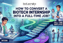 A digital illustration with an informational layout. At the top, a title reads: 'HOW TO CONVERT A BIOTECH INTERNSHIP INTO A FULL-TIME JOB?' with a 'Biotecnika Global' logo. The main visual flow starts on the left with a young male intern with a backpack and lab coat working at a microscope, labeled 'INTERN'. A winding path with steps and icons leads from him towards the right. Each step is labeled: 'BUILD SKILLS', 'NETWORK', 'SHOW INITIATIVE', 'CONTRIBUTE'. The path ends with a group of diverse scientists and professionals. One man holds a signed contract and leads the team, with text 'FULL-TIME EMPLOYEE' nearby. Advanced lab equipment and screens with biotech data surround them. The image illustrates a clear career path with actionable steps.