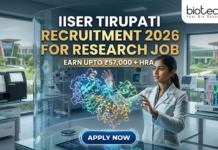 IISER Tirupati Recruitment 2026 for Research Job | Earn Upto ₹57,000 + HRA IISER Tirupati Recruitment for Research Job Earn Upto ₹57K. A high-tech, futuristic featured image for a research job recruitment at IISER Tirupati for 2026. The scene features a female researcher in a sleek, modern lab coat interacting with a glowing, holographic 3D protein model suspended in the air. The background showcases a state-of-the-art laboratory with advanced equipment and a view of the contemporary IISER Tirupati campus through large glass windows. The Biotecnika logo is positioned at the top right. The main heading "IISER TIRUPATI RECRUITMENT 2026 FOR RESEARCH JOB" is displayed in bold gold and white letters, accompanied by the tagline "EARN UPTO ₹57,000 + HRA." A prominent, glowing "APPLY NOW" button is located at the bottom center.