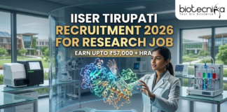 IISER Tirupati Recruitment 2026 for Research Job | Earn Upto ₹57,000 + HRA IISER Tirupati Recruitment for Research Job Earn Upto ₹57K. A high-tech, futuristic featured image for a research job recruitment at IISER Tirupati for 2026. The scene features a female researcher in a sleek, modern lab coat interacting with a glowing, holographic 3D protein model suspended in the air. The background showcases a state-of-the-art laboratory with advanced equipment and a view of the contemporary IISER Tirupati campus through large glass windows. The Biotecnika logo is positioned at the top right. The main heading "IISER TIRUPATI RECRUITMENT 2026 FOR RESEARCH JOB" is displayed in bold gold and white letters, accompanied by the tagline "EARN UPTO ₹57,000 + HRA." A prominent, glowing "APPLY NOW" button is located at the bottom center.