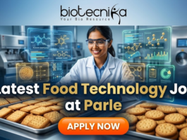 Latest Food Technology Job at Parle – BSc & BTech Graduates Apply Now! Latest Food Technology Job at Parle – BSc & BTech Graduates Apply Now. An advertisement featuring a smiling woman in a lab coat and safety glasses, working in a food production environment surrounded by futuristic holographic displays of "FLAVOR COMPOUNDS" and "NUTRIENT CHAINS." Large text reads "Latest Food Technology Job at Parle." At the top is the "biotecnika Your Bio Resource" logo, and a large "APPLY NOW" button is at the bottom. Trays of biscuits are on the counter.