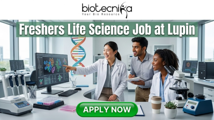 Latest Life Science Job at Lupin Freshers Welcome to Apply Latest Life Science Job at Lupin Freshers Welcome to Apply. A professional 1280x720 featured image for a "Freshers Life Science Job at Lupin." The Biotecnika logo is placed at the top center. The main heading reads "Freshers Life Science Job at Lupin" in a bold, clean font. The background features a realistic, high-tech laboratory where three enthusiastic young scientists—two women and one man—are collaborating and smiling. One scientist is pointing toward a large monitor displaying detailed 3D protein structures and genomic data. The lab environment is bright and modern, filled with scientific equipment like microscopes and pipettes. At the bottom, a prominent green "APPLY NOW" button encourages viewers to take action.