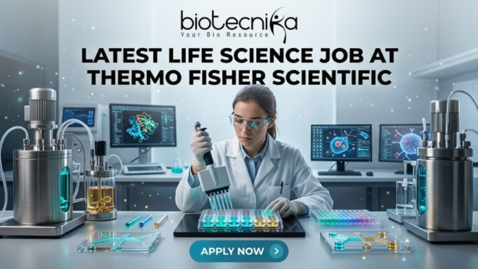 Latest Life Science Job at Thermo Fisher Scientific Apply Today Latest Life Science Job at Thermo Fisher Scientific Apply Today. A professional and vibrant featured image for a "Latest Life Science Job at Thermo Fisher Scientific." The image showcases a scientist in a white lab coat and safety goggles, precisely working with a multichannel pipette and a multi-well plate filled with glowing blue and green liquids. The background is a futuristic, high-tech laboratory with advanced bioreactors and computer screens displaying molecular structures. The Biotecnika logo is featured at the top, the main job title is in bold black text in the center, and a sleek teal "APPLY NOW" button is positioned at the bottom.
