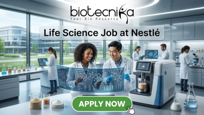 Life Science Job at Nestlé Nutrition Officer Role Life Science Job at Nestlé Nutrition Officer Role. A professional featured image titled "Life Science Job at Nestlé". The image showcases the Biotecnika logo at the top and a vibrant green "APPLY NOW" button at the bottom. The background depicts a bright, high-tech laboratory where two scientists—a woman and a man—are smiling and collaborating over a futuristic holographic display of molecular structures. Other researchers and advanced laboratory equipment are visible in the sleek, modern setting.