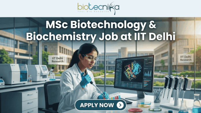 MSc Biotechnology & Biochemistry Job at IIT Delhi (1) MSc Biotechnology & Biochemistry Job at IIT Delhi. A professional and realistic featured image for a job opening. At the top center is the Biotecnika Global logo, followed by large, bold text reading "MSc Biotechnology & Biochemistry Job at IIT Delhi." The central scene depicts a female researcher in a white lab coat working in a high-tech laboratory, using a pipette on colorful samples while viewing a 3D molecular structure on a large monitor. The background shows advanced lab equipment and a clear view of the IIT Delhi Research campus through large windows. At the bottom, there is a prominent teal button that says "APPLY NOW" with a white arrow icon.