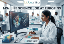 MSc Life Science Job Alert: Kickstart Your Career with Eurofins in Business Development! MSc Life Science Job At Eurofins | Apply Before It's Gone. A featured image for a job advertisement titled "MSc LIFE SCIENCE JOB AT EUROFINS." The image depicts a high-tech, modern laboratory setting. In the foreground, a female scientist in a white lab coat is seated at a desk, looking intently at a large computer monitor displaying complex, colorful 3D molecular structures. The lab is bright and clean, featuring various scientific instruments including pipettes, test tubes filled with multi-colored liquids, and high-end analytical machinery in the background where other scientists are also working. At the top center, there is a white rectangular banner with the "biotecnika" logo. Below the main heading, which is written in bold, dark blue letters, there is a prominent, glowing light-blue "APPLY NOW" button at the bottom center. The overall aesthetic is professional, realistic, and sleek.