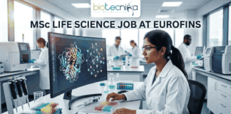MSc Life Science Job Alert: Kickstart Your Career with Eurofins in Business Development! MSc Life Science Job At Eurofins | Apply Before It's Gone. A featured image for a job advertisement titled "MSc LIFE SCIENCE JOB AT EUROFINS." The image depicts a high-tech, modern laboratory setting. In the foreground, a female scientist in a white lab coat is seated at a desk, looking intently at a large computer monitor displaying complex, colorful 3D molecular structures. The lab is bright and clean, featuring various scientific instruments including pipettes, test tubes filled with multi-colored liquids, and high-end analytical machinery in the background where other scientists are also working. At the top center, there is a white rectangular banner with the "biotecnika" logo. Below the main heading, which is written in bold, dark blue letters, there is a prominent, glowing light-blue "APPLY NOW" button at the bottom center. The overall aesthetic is professional, realistic, and sleek.