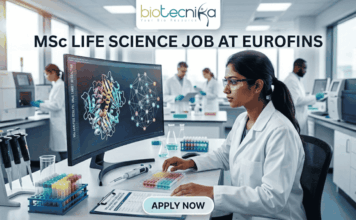 MSc Life Science Job Alert: Kickstart Your Career with Eurofins in Business Development! MSc Life Science Job At Eurofins | Apply Before It's Gone. A featured image for a job advertisement titled "MSc LIFE SCIENCE JOB AT EUROFINS." The image depicts a high-tech, modern laboratory setting. In the foreground, a female scientist in a white lab coat is seated at a desk, looking intently at a large computer monitor displaying complex, colorful 3D molecular structures. The lab is bright and clean, featuring various scientific instruments including pipettes, test tubes filled with multi-colored liquids, and high-end analytical machinery in the background where other scientists are also working. At the top center, there is a white rectangular banner with the "biotecnika" logo. Below the main heading, which is written in bold, dark blue letters, there is a prominent, glowing light-blue "APPLY NOW" button at the bottom center. The overall aesthetic is professional, realistic, and sleek.