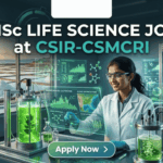 MSc Life Science Job at CSIR-CSMCRI | Apply For JRF Role Today!! MSc Life Science Job at CSIR-CSMCRI Apply For JRF Role Today!! A unique featured image for "MSc Life Science Job at CSIR-CSMCRI." It depicts a scientist in a specialized lab focusing on marine biotechnology, with bioreactors containing green algae in the foreground and a view of salt pans at sunset through the window. The Biotecnika logo is at the top, and a green "Apply Now" button is at the bottom.