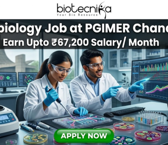 A vibrant microbiology lab featuring researchers working with Petri dishes and automated lab equipment. The tagline "Earn Upto ₹67,200 Salary/ Month" is displayed at the top. The Open Hand Monument is visible in the background. The Biotecnika logo is at the top, and a green "APPLY NOW" button is at the bottom.