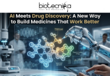 AI Meets Drug Discovery: A New Way to Build Medicines. A futuristic 1280x720 featured image for a news article. At the top center is the Biotecnika logo. Below it, the headline reads: "AI Meets Drug Discovery: A New Way to Build Medicines That Work Better." The visual features a high-tech laboratory where a robotic arm with glowing blue circuitry uses a precision needle to manipulate a glowing 3D molecular structure. Surrounding the molecule are holographic data interfaces showing neural networks, chemical analysis charts, and text labels like "Dynamic binding energy." In the blurred background, scientists work in a modern lab with advanced medical equipment, blending the themes of artificial intelligence and pharmaceutical research.
