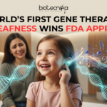 World’s First Gene Therapy for Deafness Wins FDA Approval NEWS World’s First Gene Therapy for Deafness Wins FDA Approval. An emotionally powerful, 1280x720 featured image for a news article titled "WORLD’S FIRST GENE THERAPY FOR DEAFNESS WINS FDA APPROVAL." At the top center sits the black Biotecnika logo. The central focus is a young girl with an expression of pure joy and wonder, touching her ear as a glowing, ethereal DNA double helix transforms into vibrant, colorful musical notes and sound waves flowing toward her. In the soft-focus background, a mother watches with tears of happiness, and an FDA certificate is visible on a desk. The overall scene blends medical breakthrough with human emotion in a warm, clinical yet hopeful setting.