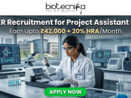 NIPER Recruitment for Project Assistant Role | Earn Upto ₹42,000. A scientist using an automated liquid handling system in a modern research facility. Header: "NIPER Recruitment for Project Assistant Role" with the HRA salary tagline. Biotecnika logo at top, green "Apply Now" button.
