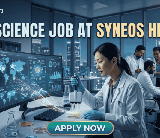 Top Life Science Job at Syneos Health – Central Monitor Role Hiring Now! Life Science Job at Syneos Health | Central Monitor Role. A professional promotional graphic for a "Life Science Job at Syneos Health" featuring the Biotecnika logo at the top. The image depicts a female scientist in a white lab coat and blue gloves using a multichannel pipette on a microplate in a modern, high-tech laboratory. A large computer monitor in the foreground displays complex global data visualizations, including a world map with interconnected nodes, cellular diagrams, and data graphs. In the background, other researchers are seen working at their stations. The laboratory features large glass windows that reveal a glowing city skyline at night. A large, prominent "APPLY NOW" button is centered at the bottom.