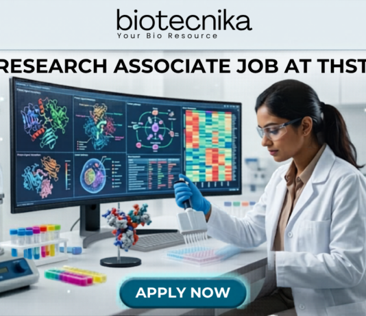 Research Associate Job at THSTI PhD Life Sciences Candidates Earn Upto ₹47,000. A realistic, high-tech featured image for a "Research Associate Job at THSTI." At the top is the Biotecnika logo. The center features a female scientist in a white lab coat and safety glasses, meticulously using a pipette over a multi-well plate. Behind her, a large curved monitor displays complex molecular structures and colorful genomic data charts. The modern laboratory is filled with advanced scientific equipment like a bioreactor and centrifuge. At the bottom, there is a prominent teal "APPLY NOW" button.
