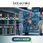 Springer Nature Hiring NOW! Science Communication Job You Can’t Miss Science Communication Job at Springer Nature Don't Miss It. A professional featured image for a "Science Communication Job at Springer Nature." The layout features the Biotecnika logo at the top and a prominent "Apply Now" button at the bottom. To the right, a professional woman in a modern setting interacts with a glowing, futuristic DNA and CRISPR hologram, symbolizing science communication. Large, bold text on the left reads "SCIENCE COMMUNICATION JOB at Springer Nature.
