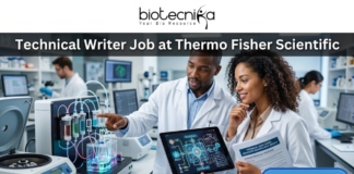 Technical Writer Job at Thermo Fisher Scientific – Life Science Career in Bangalore! A professional and realistic featured image for a job posting. Two scientists—a man and a woman—are collaborating in a modern, high-tech laboratory filled with advanced scientific equipment like centrifuges and fluidic systems. They are focused on a digital tablet displaying complex technical data and diagrams. At the top, the Biotecnika logo sits above the bold title "Technical Writer Job at Thermo Fisher Scientific." A vibrant green "APPLY NOW" button is positioned in the bottom right corner.