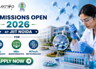 Admissions Open 2026-27 at JIIT Noida for MSc Microbiology, MSc Bioinformatics & MTech Biotechnology Admissions Open 2026 at JIIT Noida for MSc Microbiology, Bioinformatics & MTech Biotechnology. Featured banner for “Admissions Open 2026 at JIIT Noida” featuring the Biotecnika and JIIT logos at the top, a scientist performing drug research in a modern laboratory, molecular and pharmaceutical-themed graphics, a university campus backdrop, program highlights for MSc Microbiology, MSc Bioinformatics, and MTech Biotechnology, and a bold “Apply Now” button at the bottom.