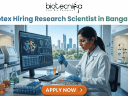 Apotex Hiring Research Scientist in Bangalore Apply Now. A job advertisement banner for Apotex hiring a Research Scientist in Bangalore, featuring the biotecnika logo. The image shows a female scientist in a lab coat focused on molecular structures on a monitor, with an "APPLY NOW" button and "Direct R&D Opportunity" text.