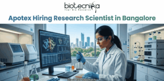 Apotex Hiring Research Scientist in Bangalore Apply Now. A job advertisement banner for Apotex hiring a Research Scientist in Bangalore, featuring the biotecnika logo. The image shows a female scientist in a lab coat focused on molecular structures on a monitor, with an "APPLY NOW" button and "Direct R&D Opportunity" text.