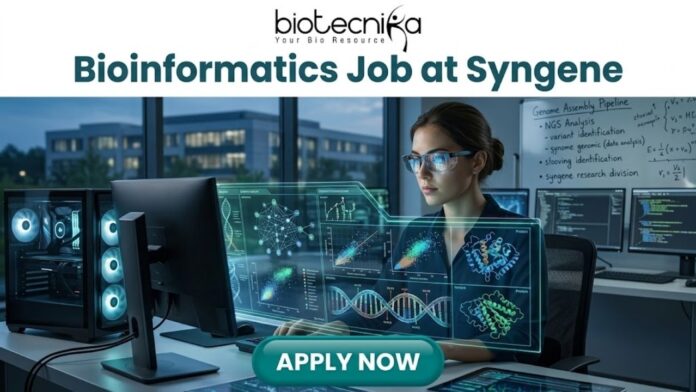 Bioinformatics Job at Syngene Apply For Principal Scientist Role Today! Bioinformatics Job at Syngene Apply For Principal Scientist Role Today! A promotional banner for biotecnika advertising a "Bioinformatics Job at Syngene." The biotecnika logo is at the top center. The main image shows a woman with smart glasses working intensely at a high-tech computational workstation. A holographic overlay features detailed biological data visualizations, including DNA double-helices, molecular models, and complex data graphs. In the background, a whiteboard has the text "Genome Assembly Pipeline," and an urban night scene is visible through the window. At the bottom, a prominent green "APPLY NOW" button is centered.