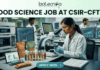 CSIR-CFTRI Recruitment 2026: Exciting Food Science Job Opening in Mysuru CSIR-CFTRI Recruitment 2026 Exciting Food Science Job Opening in Mysuru "A detailed, professional featured image banner for a job page. At the top, a white header band displays the Biotecnika logo (the black text and leaf-icon from image_15.png reading 'biotecnika Your Bio Resource') above a large, bold black headline, 'FOOD SCIENCE JOB AT CSIR-CFTRI'. Below the header is a realistic photograph of a modern, bustling, well-equipped food science research laboratory. In the foreground, a female scientist of South Asian descent in a lab coat is carefully looking through a compound microscope. Behind her and at a separate station, an older male scientist works with advanced high-performance liquid chromatography (HPLC) analytical equipment and another computer, while a younger male scientist analyzes data on a large monitor. The workbench is covered with various ingredient vials, packaged 'Fortified Grains' and 'Novel Protein Bar' prototypes, and computers displaying complex data graphs, molecular structures, and composition charts. A lab notebook with doodles is also present. At the very bottom, a solid teal footer bar features a prominent call-to-action button with white text that reads 'APPLY NOW' with a right-pointing arrow."