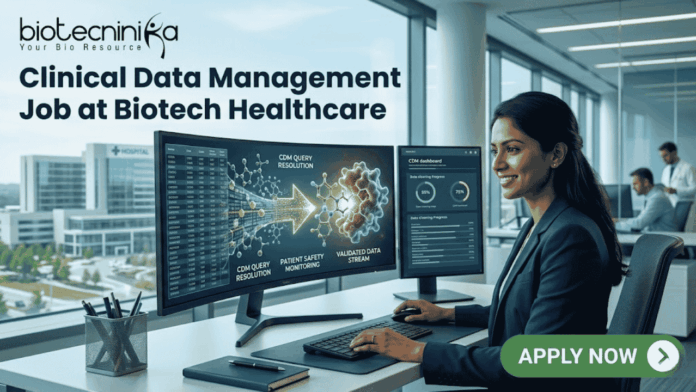 Clinical Data Management Job at Biotech Healthcare Apply Online Here Clinical Data Management Job at Biotech Healthcare Apply Online Here. A corporate job advertisement for a "Clinical Data Management Job at Biotech Healthcare," featuring a professional female of South Asian descent smiling and working at a desk with dual monitors. The screens display data visualizations of molecular structures and CDM progress dashboards with text labels like "CDM QUERY RESOLUTION" and "VALIDATED DATA STREAM." Through the large office window behind her, a modern building labeled "HOSPITAL" and "CLINICAL RESEARCH CENTRE" is visible. The Biotecnika logo is at the top left, and a prominent green "APPLY NOW" button with an arrow icon is at the bottom right. Other colleagues are working blurred in the background.
