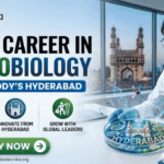 Dr. Reddy’s Microbiology Job 2026 QC Micro Role for B.Sc Microbiology Candidates. A promotional recruitment banner for Biotecnika, advertising "YOUR CAREER IN MICROBIOLOGY AT DR. REDDY’S HYDERABAD". On the left side of the banner, a list of bullet points with icons outlines the benefits of the role: "WORKING WITH ADVANCED TECH", "INNOVATE FROM HYDERABAD", and "GROW WITH GLOBAL LEADERS". Below this list, there is a large green button that says "APPLY NOW" with a right-arrow, and the website address "www.biotecnika.org" is displayed beneath it. The Biotecnika logo, with the tagline "Your Bio Resource", is placed at the top-left corner. On the right side, a female scientist in a white lab coat and safety glasses is shown working in a laboratory. She is using a pipette and smiling as she looks at a glowing, miniature, incredibly detailed model of the Charminar monument inside a large petri dish. The word "HYDERABAD" is written on the base of the miniature model. In the background, beyond the laboratory window, a view of the real Charminar monument in Hyderabad is visible at twilight. A DNA helix and other molecular models glow around the petri dish.