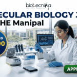 ₹61,000 Salary Molecular Biology Job at MAHE Manipal | Apply. A professional recruitment banner from Biotecnika for a "Molecular Biology Job at MAHE Manipal." The image features a female scientist in a lab coat and safety glasses, meticulously using a multichannel pipette at a well-equipped laboratory bench. The banner prominently highlights the text "Earn Upto ₹61,000 Salary." and includes other text elements like "biotecnika" and "MOLECULAR BIOLOGY JOB at MAHE Manipal." In the background, other lab instruments, computer monitors displaying biological data, and a modern university campus through the windows are visible. Icons for a pipette, a DNA helix, and a multiwell plate, along with hexagonal frames showing biological research images, represent the drug research theme. A large, green, glowing "APPLY NOW" button is in the bottom right corner.