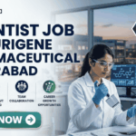 Scientist Job in Hyderabad for MSc Graduates | Aurigene Pharmaceutical Hiring Now Scientist Job for MSc Graduates at Aurigene Pharmaceutical. A professional corporate recruitment banner for a "SCIENTIST JOB AT AURIGENE PHARMACEUTICAL HYDERABAD" by Biotecnika. The image features a focused female scientist of Indian heritage in a lab coat and safety glasses, working with a multichannel pipette in a state-of-the-art pharmaceutical laboratory. The background shows a modern research facility with large windows overlooking a city skyline at dusk. Hexagonal frames to the right showcase a DNA helix, chemical glassware, and data analytics. Below the main headline, four icons highlight key aspects: Advanced Drug R&D, High-Throughput Screening, Team Collaboration, and Career Growth Opportunities. A prominent teal "APPLY NOW" button is positioned at the bottom left.
