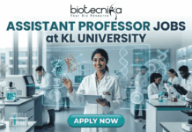 Assistant Professor Jobs at KL University | Food Technology Jobs for PhD Graduates A professional recruitment banner for Assistant Professor jobs at KL University's Food Technology Department. The image features two scientists in a modern laboratory working with bioreactors and 3D food printing technology. It includes the Biotecnika logo at the top and a prominent orange "Apply Now" button at the bottom.